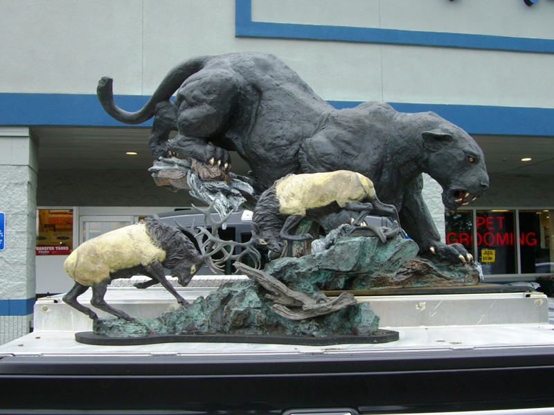 The prominent bronze sculptor Lorenzo Giglieri drives around Aurora, Oregon with his art in his pickup bed.